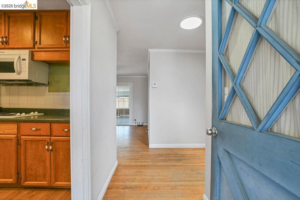 805 Calero Street Milpitas, CA 95035 - Photo 3 of 23 Entryway featuring a decorative paneled door, wood-finish flooring, and recessed lighting