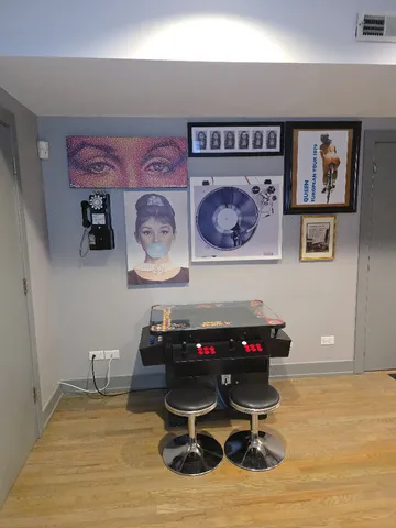 a view of a workspace with furniture