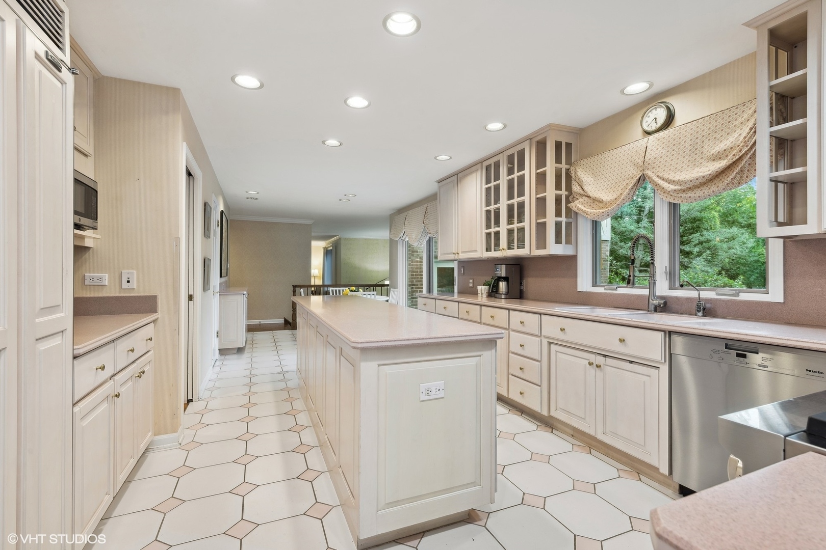 206 East Hillside Road Barrington, IL 60010 - Photo 10 of 42 a kitchen with granite countertop a sink and cabinets
