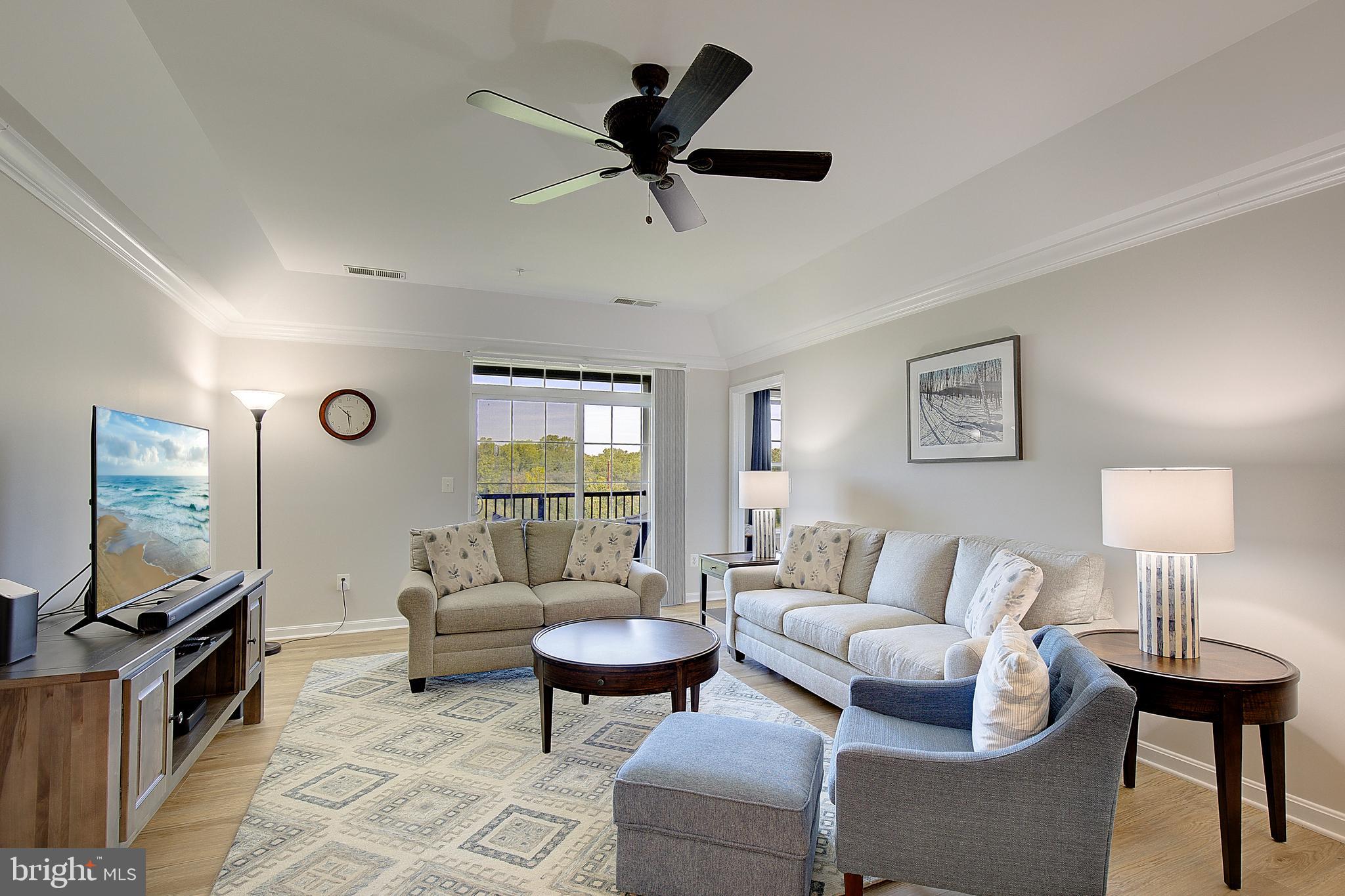 8600 Roaming Ridge Way, Unit 404 Odenton, MD 21113 - Photo 2 of 39 Bright, spacious living room