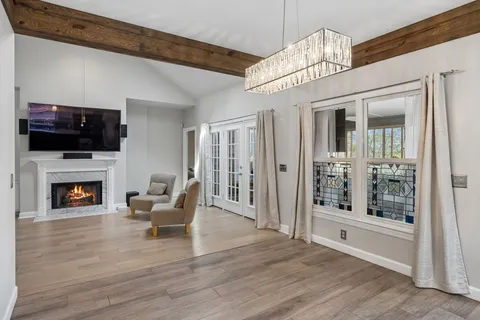a kitchen with stainless steel appliances a sink stove and refrigerator