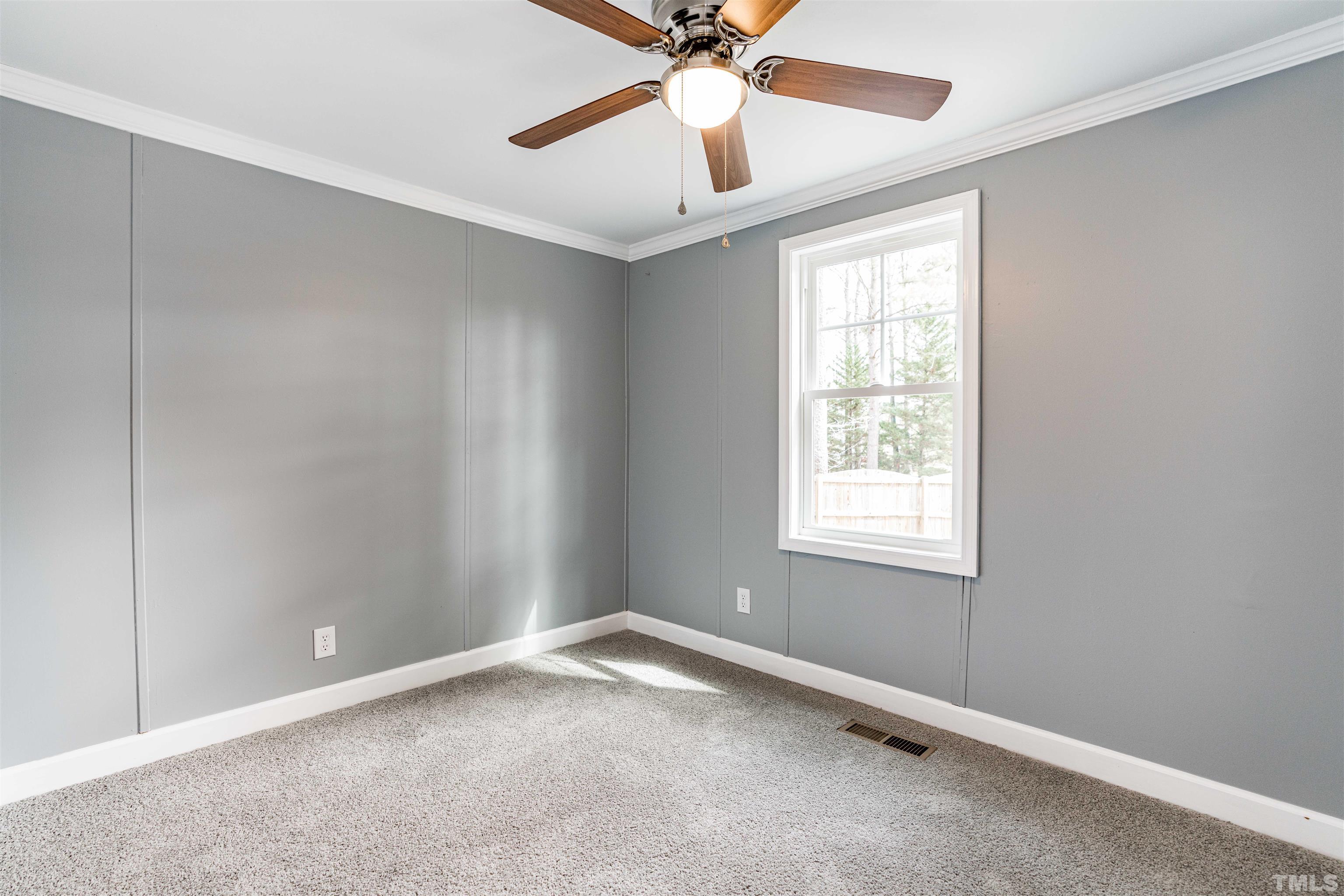 1100 Yakimas Road Raleigh, NC 27603 - Photo 21 of 26 a view of an empty room with a window