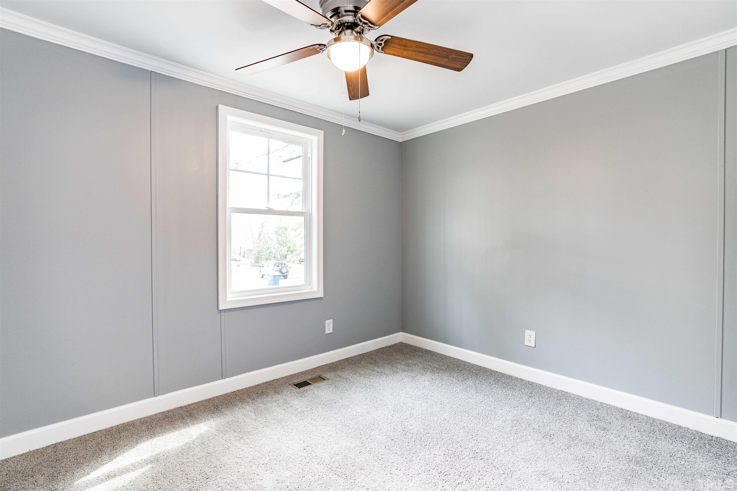 1100 Yakimas Road Raleigh, NC 27603 - Photo 22 of 26 a view of an empty room with a window
