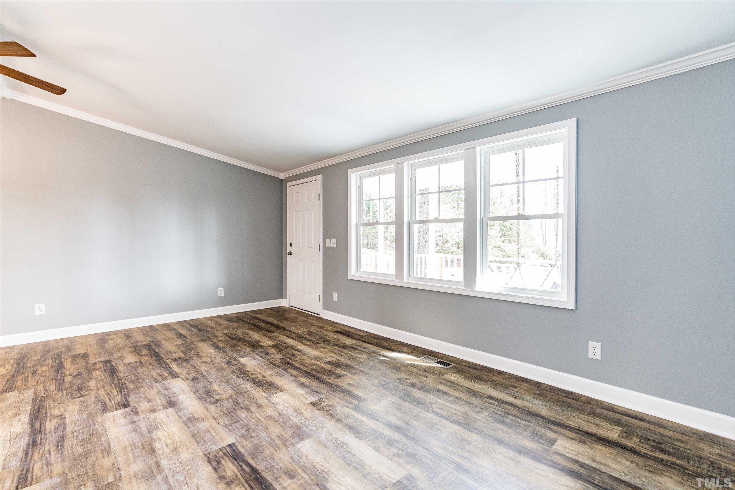 1100 Yakimas Road Raleigh, NC 27603 - Photo 9 of 26 a view of an empty room with a window