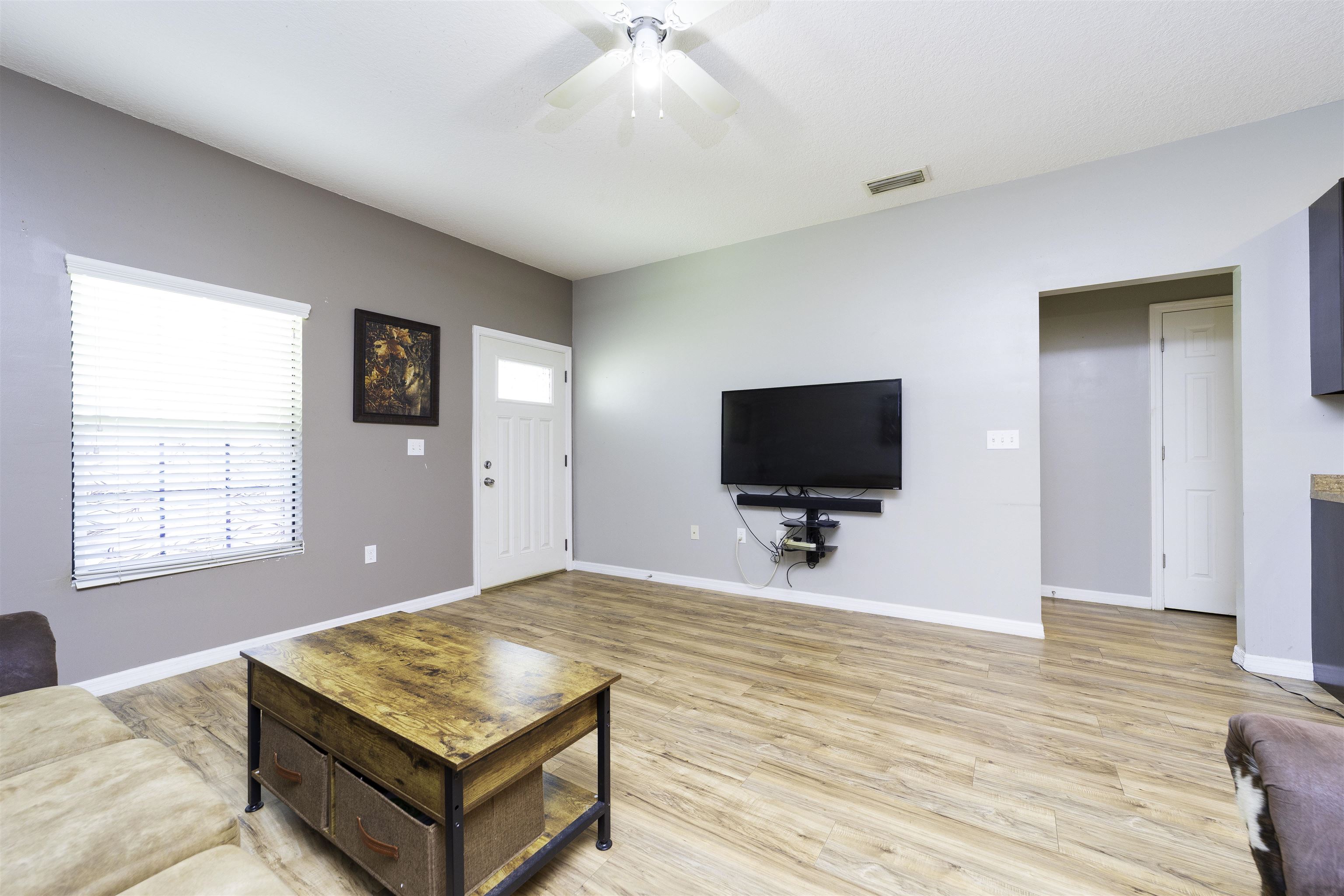 122 Osprey Road St. Augustine, FL 32086 - Photo 11 of 50 a bedroom with a bed and a flat screen tv