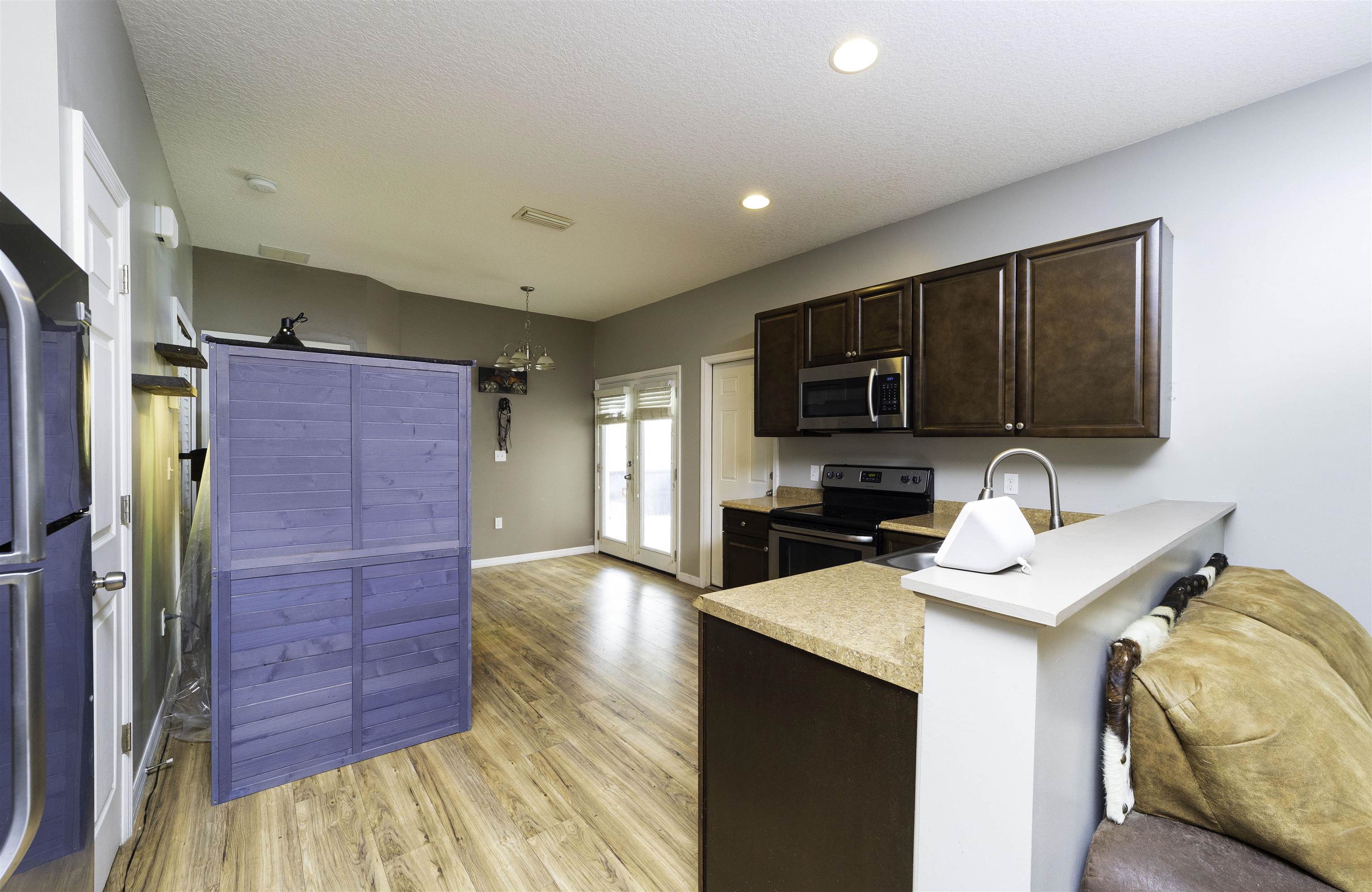 122 Osprey Road St. Augustine, FL 32086 - Photo 12 of 50 a kitchen with a sink appliances and cabinets