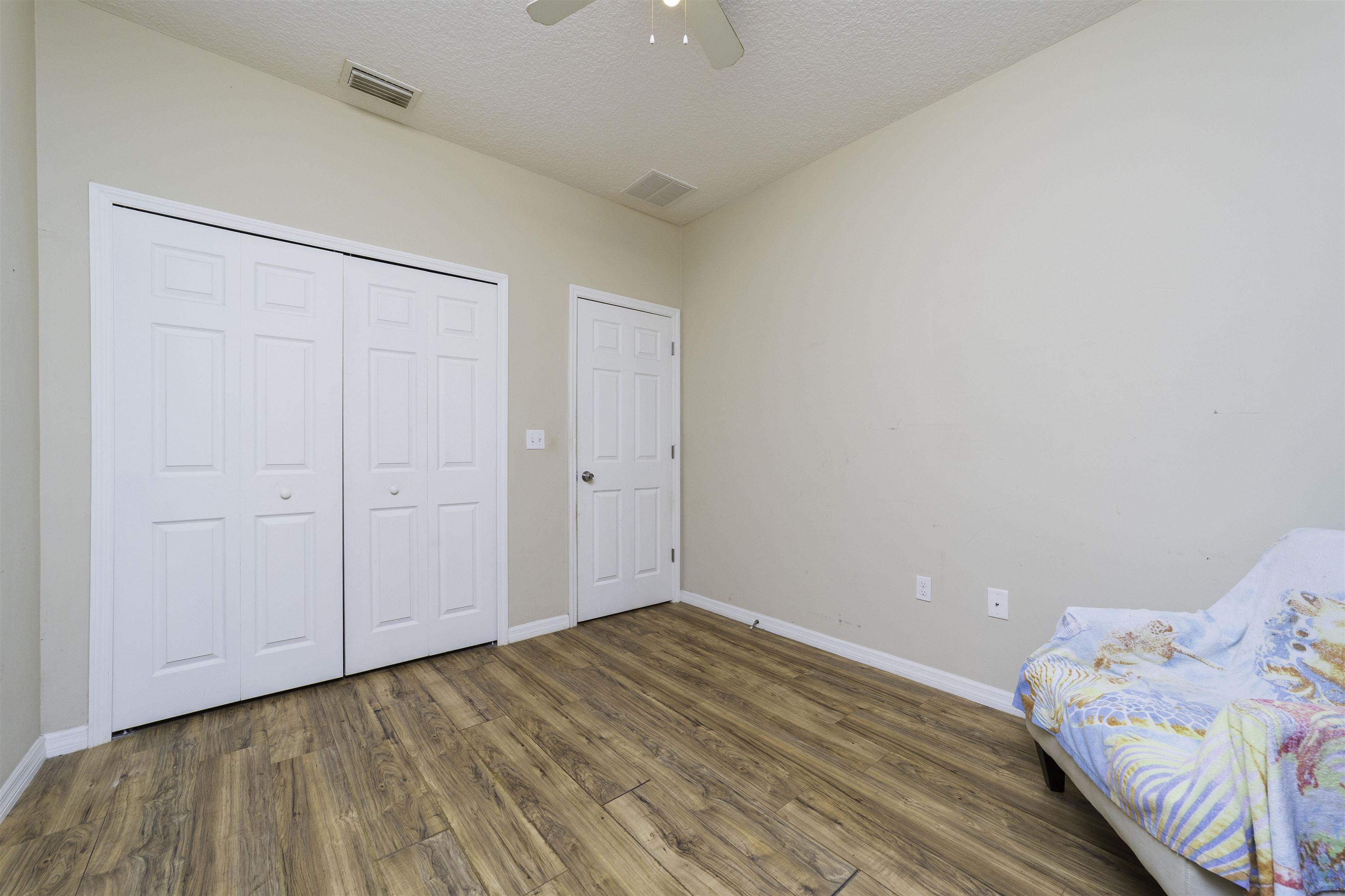 122 Osprey Road St. Augustine, FL 32086 - Photo 27 of 50 a view of bedroom with a bed and pillows