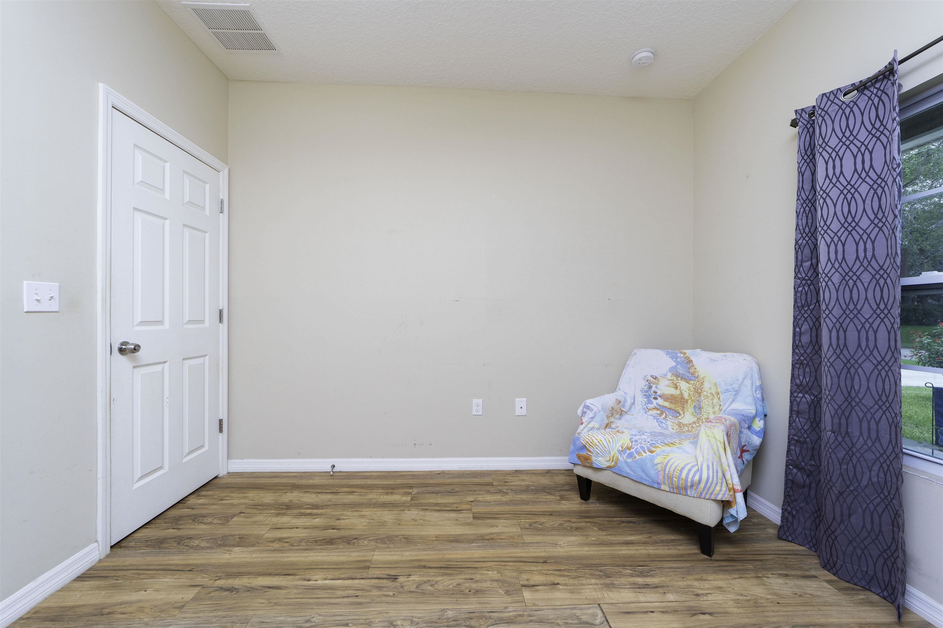 122 Osprey Road St. Augustine, FL 32086 - Photo 28 of 50 a room with toys and wooden floor