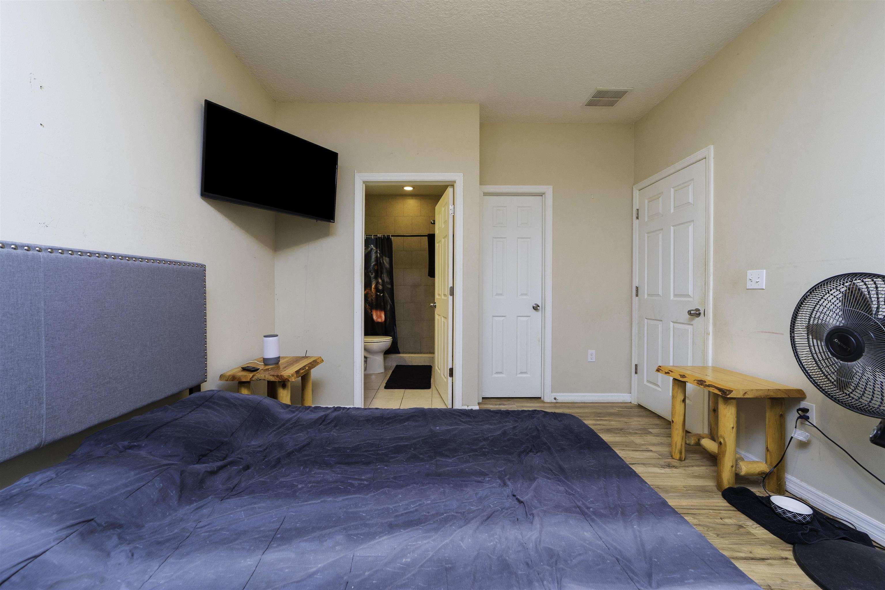 122 Osprey Road St. Augustine, FL 32086 - Photo 32 of 50 a view of a livingroom with furniture and a flat screen tv