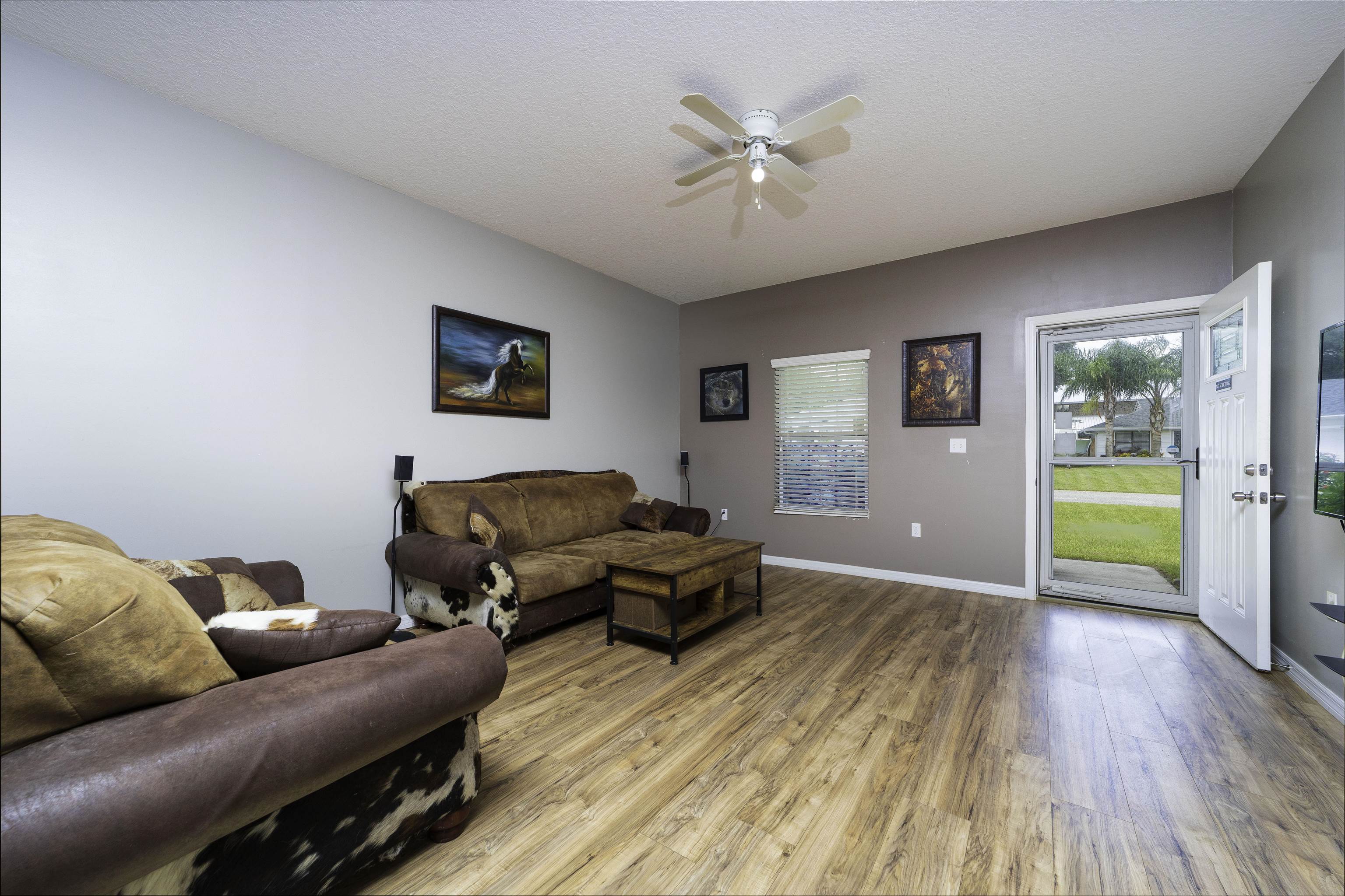 122 Osprey Road St. Augustine, FL 32086 - Photo 5 of 50 a living room with furniture and a wooden floor