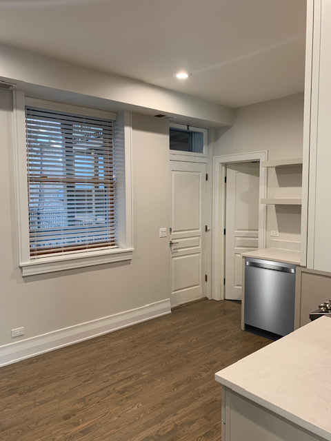 2539 West Iowa Street, Unit 3 Chicago, IL 60622 - Photo 6 of 19 a view of kitchen with stainless steel appliances refrigerator oven and cabinets
