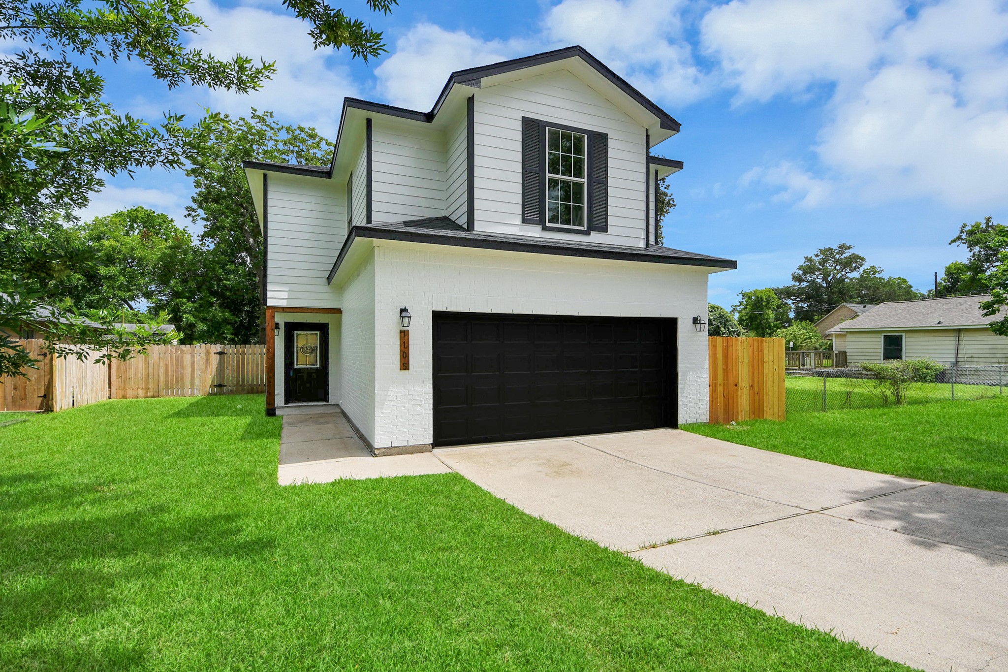 1105 East Kyle Road Clute, TX 77531 - Photo 1 of 44 1105 E Kyle Rd is a completely remodeled and updated, modern 2-story home with a striking black and white exterior. It features a 2-car garage and a wooden fence for privacy. Ideal for anyone seeking a stylish and functional home.