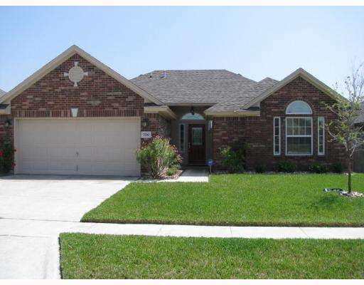 7530 Exeter Corpus Christi, TX 78414 - Photo 1 of 1 a front view of a house with a yard