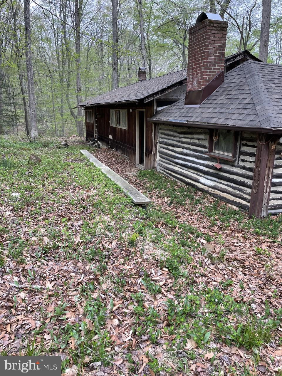 997 Chesterfield Road Annapolis, MD 21401 - Photo 62 of 69 front of log cabin