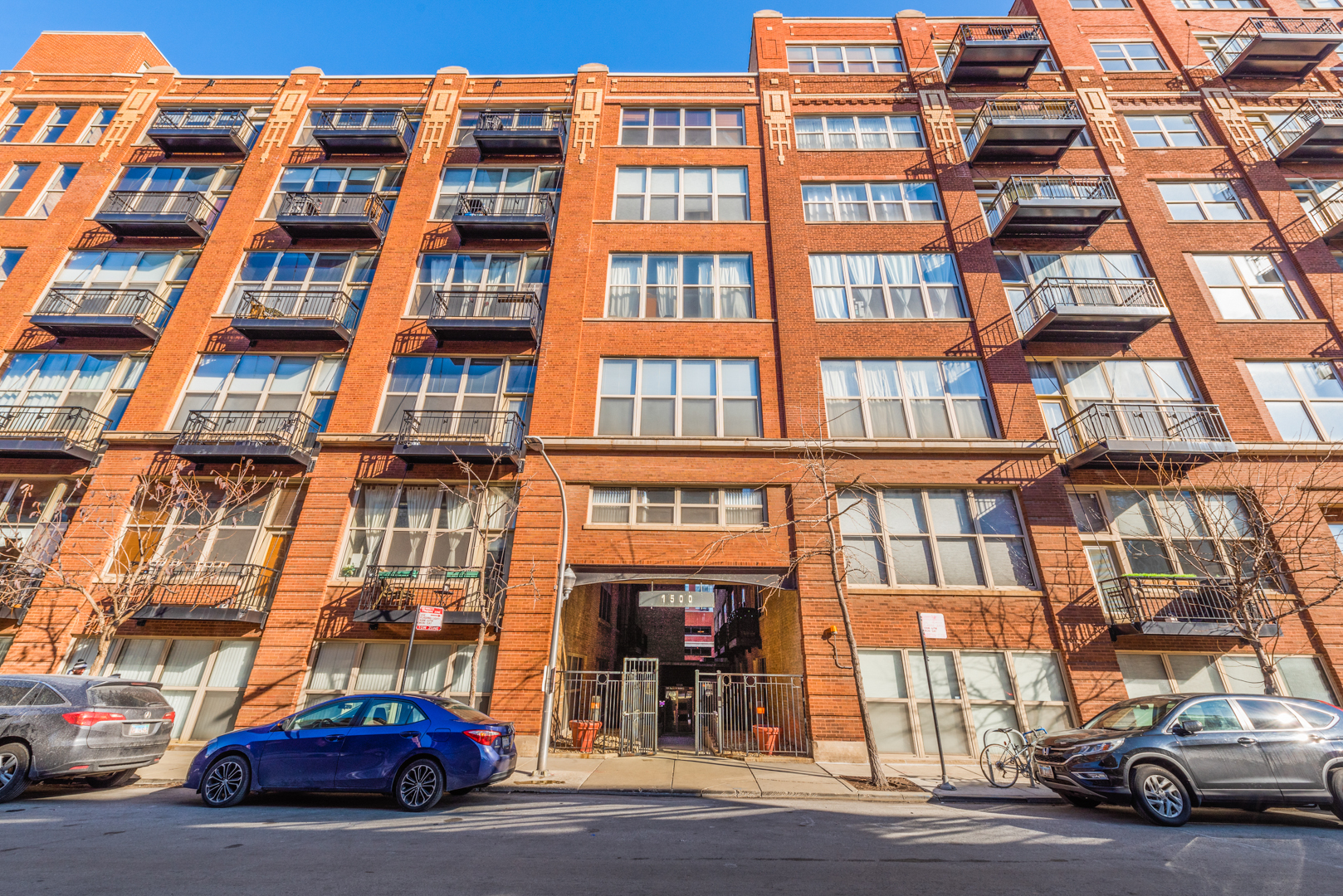 1500 West Monroe Street, Unit 127 Chicago, IL 60607 - Photo 1 of 1 a car parked in front of a building