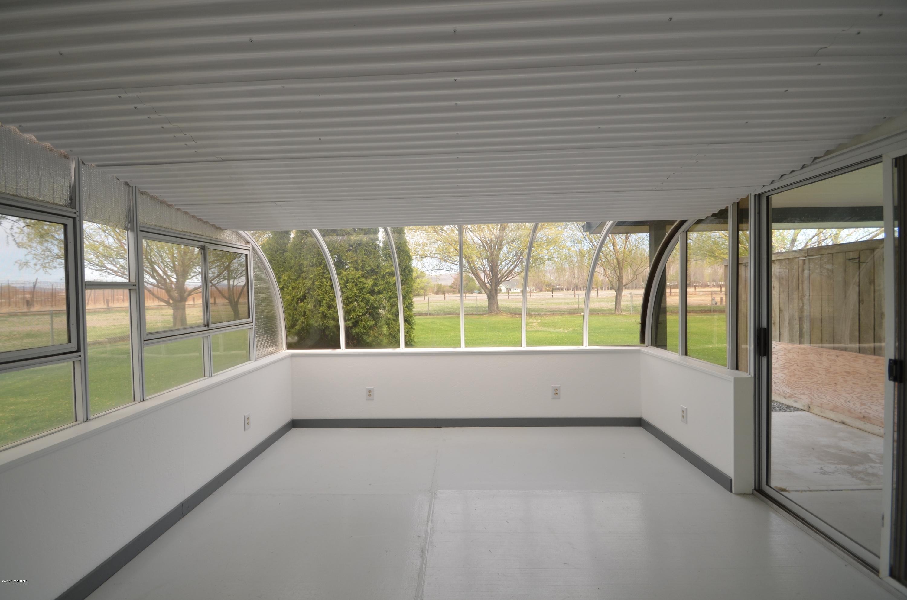 5405 Postma Road Yakima, WA 98901 - Photo 19 of 31 a view of an empty room with a large window