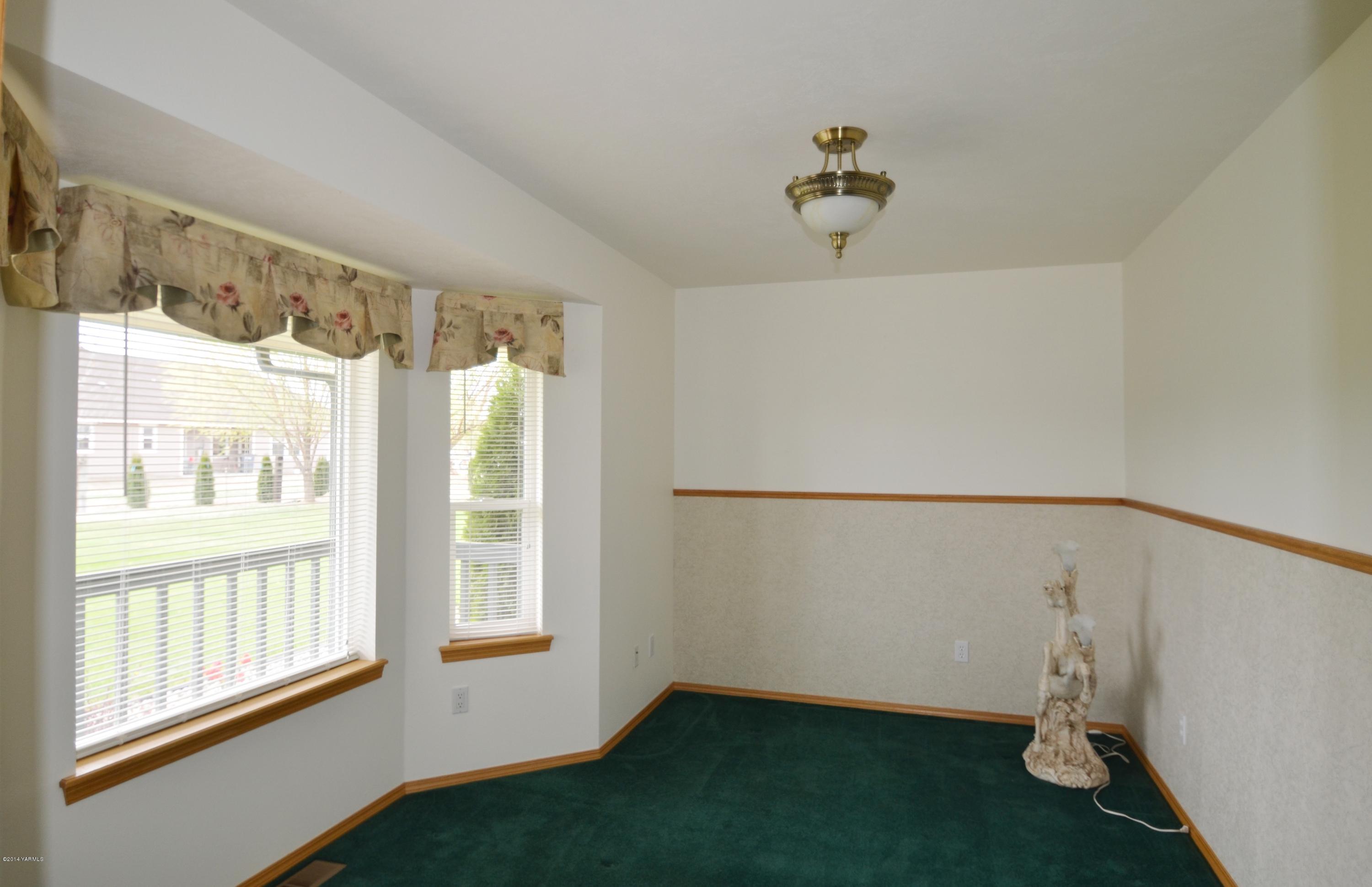 5405 Postma Road Yakima, WA 98901 - Photo 10 of 31 a view of water heater room with windows