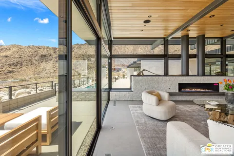 a kitchen with a table and chairs in it
