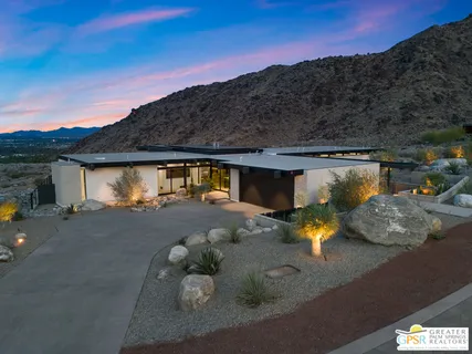 a view of a back yard of the house
