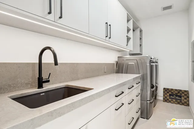 a bed room with a bed and a large window