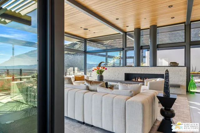 a view of a living room with furniture