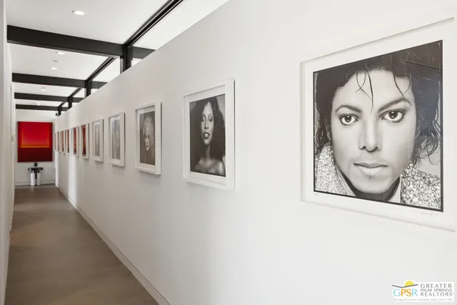 a view of a patio with table and chairs and potted plants