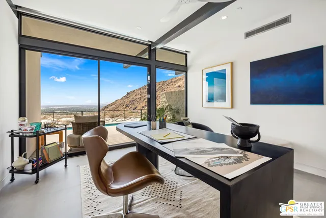 a view of a city with mountains in the background