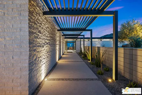a dining room with furniture and a fireplace