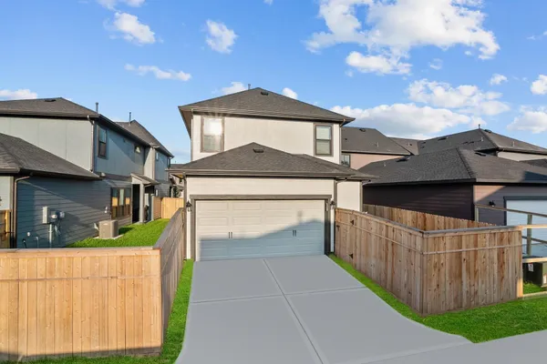 a front view of a house with yard