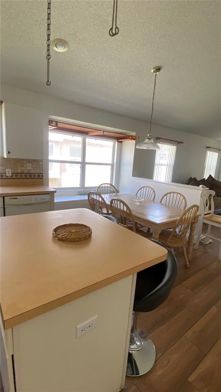 635 Rochester Loop Davenport, FL 33897 - Photo 16 of 22 a bed sitting in a bedroom next to a window