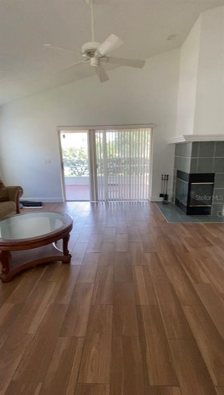 635 Rochester Loop Davenport, FL 33897 - Photo 17 of 22 a living room with furniture and a wooden floor