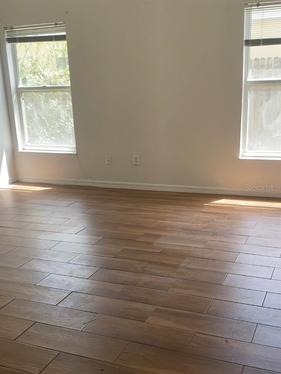 635 Rochester Loop Davenport, FL 33897 - Photo 8 of 22 an empty room with a window