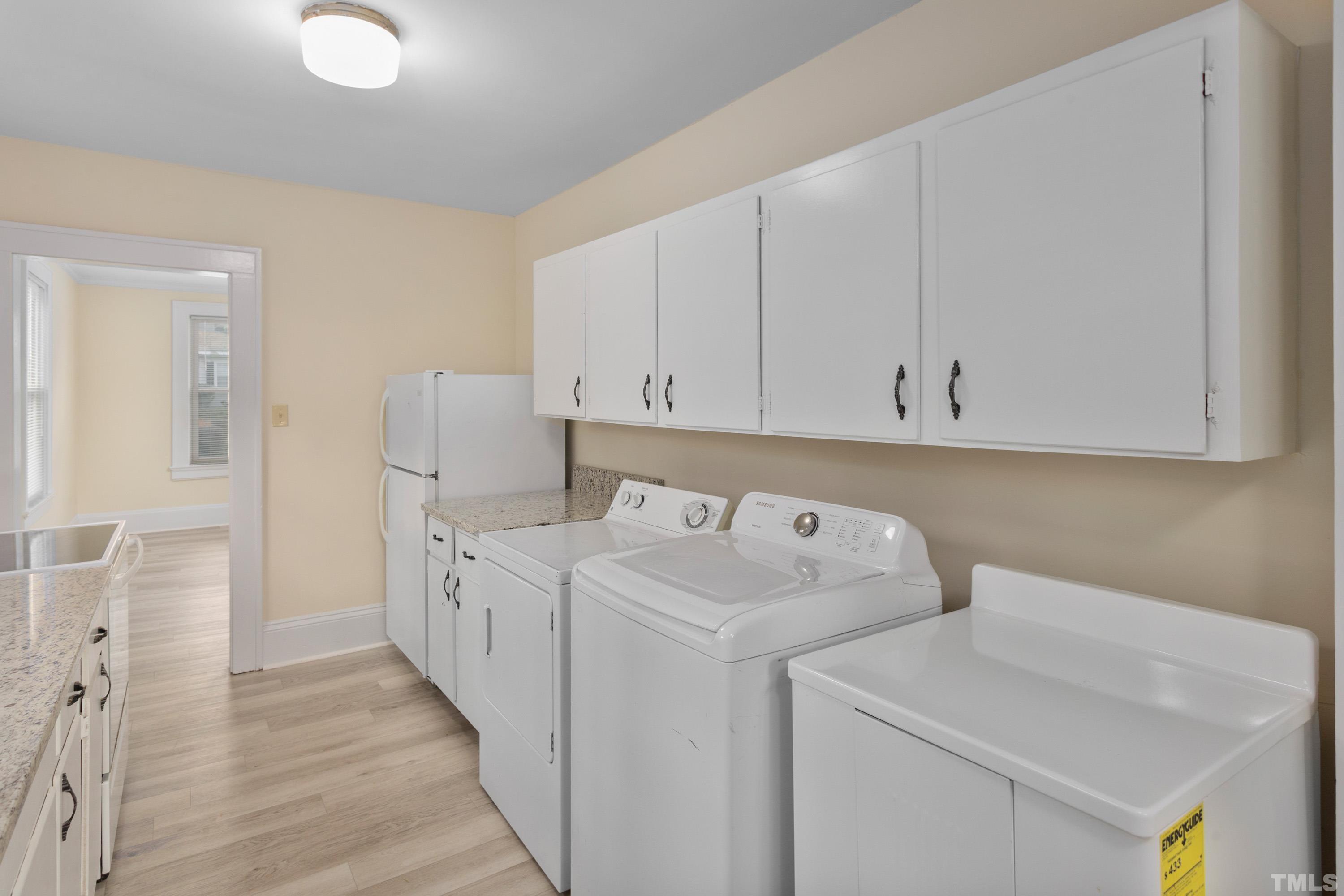 111 Turner Street Raleigh, NC 27607 - Photo 14 of 26 a utility room with dryer and washer
