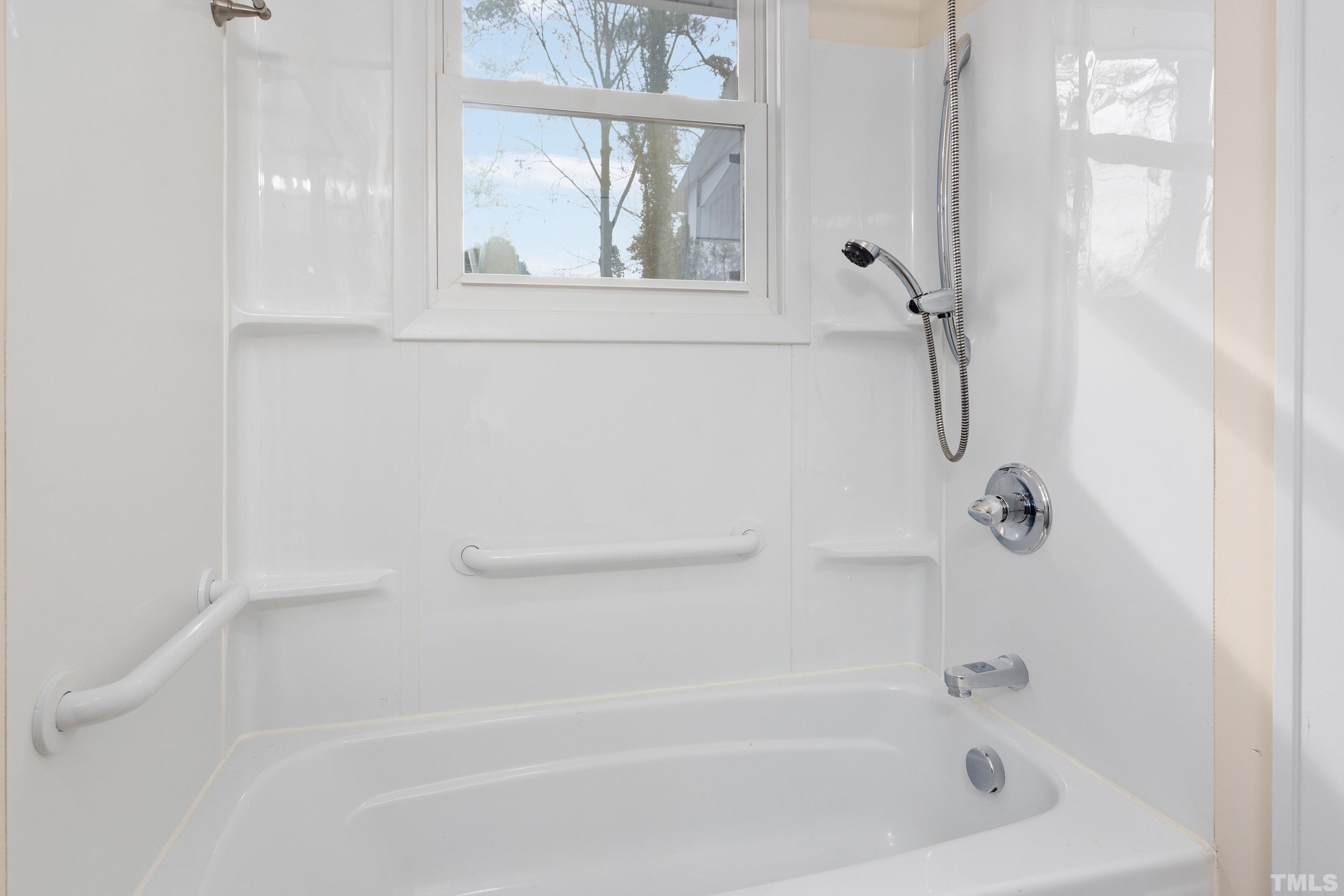 111 Turner Street Raleigh, NC 27607 - Photo 18 of 26 a bathroom with a tub