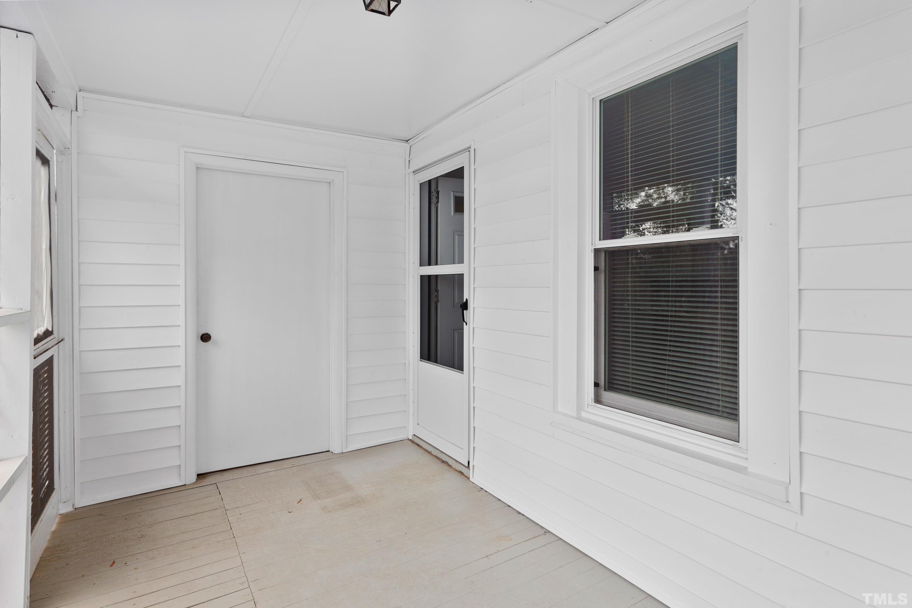 111 Turner Street Raleigh, NC 27607 - Photo 21 of 26 a view of a hallway and closet