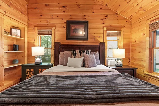 a view of a brick house with a large window