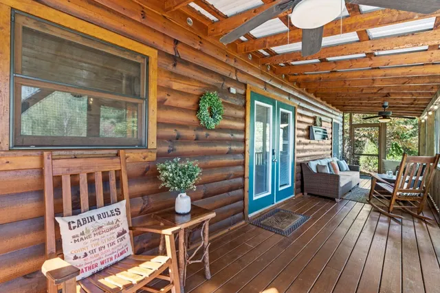 a view of a house with a tree