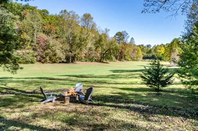 a view of a lake with a house