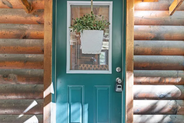 a living room with furniture fireplace and flat screen tv