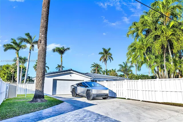 a house view with a garden space