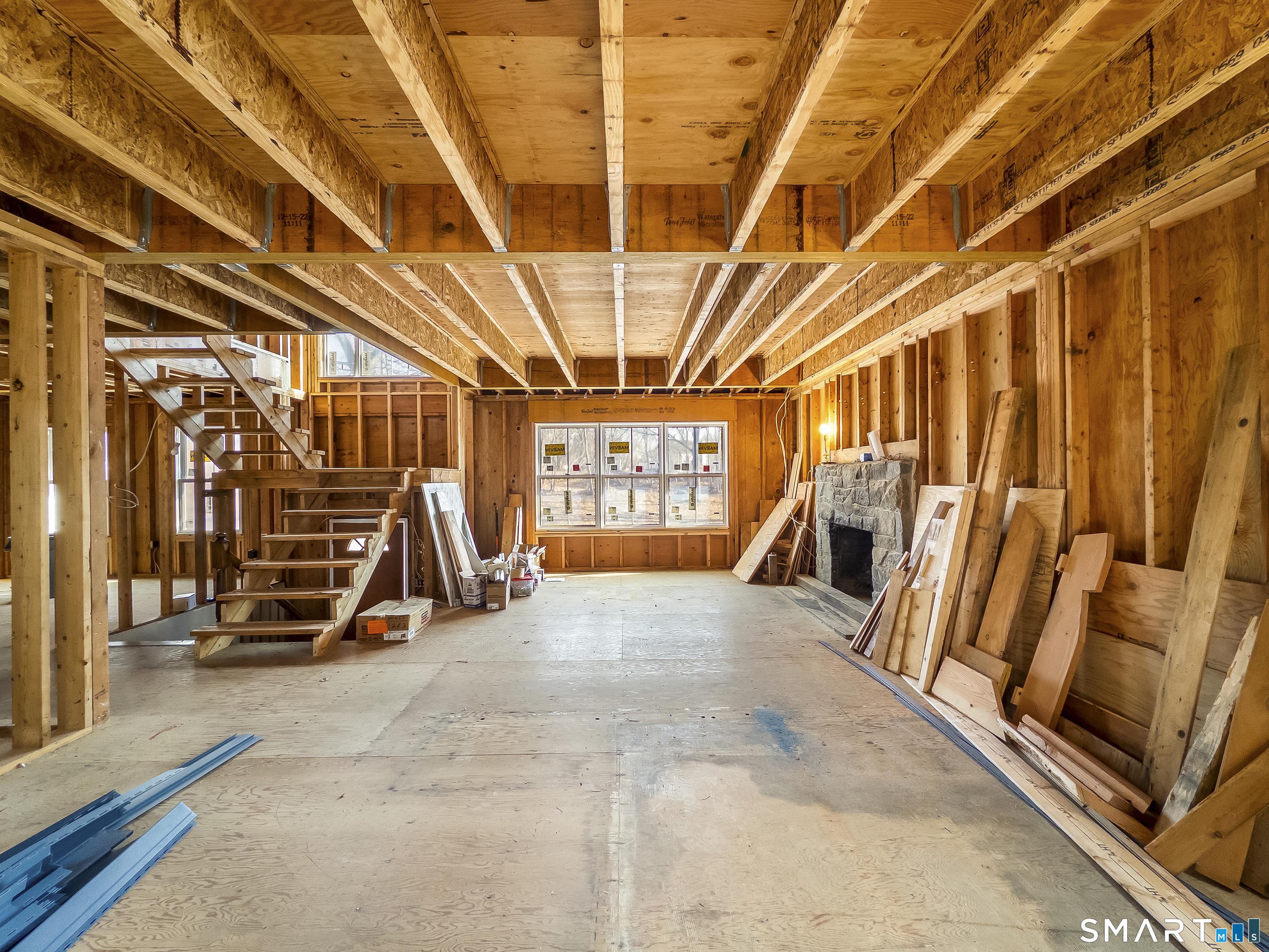 58 Grieb Road Wallingford, CT 06492 - Photo 17 of 36 a view of an empty room with wooden floor