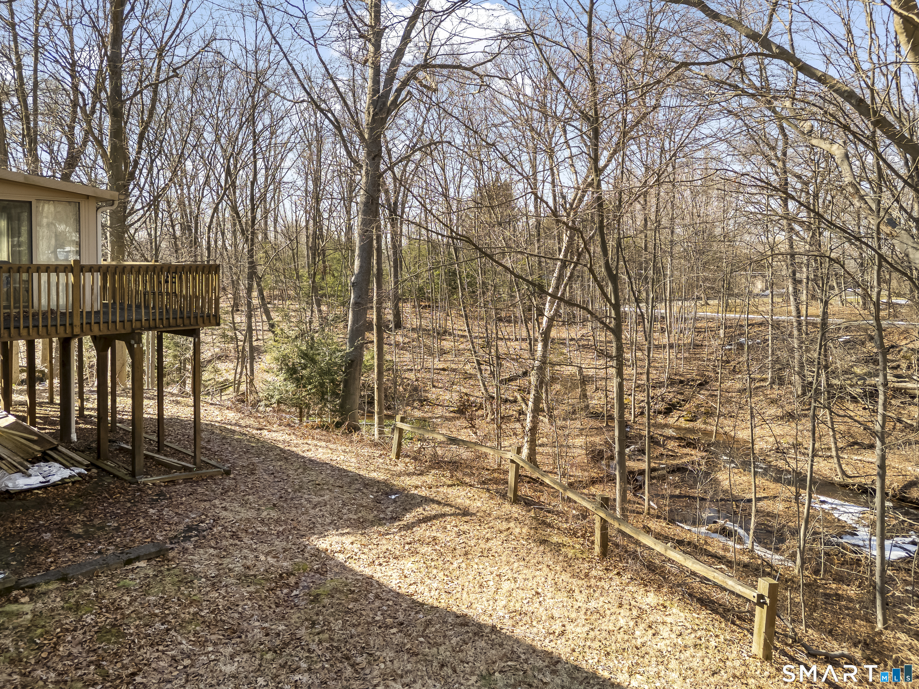 58 Grieb Road Wallingford, CT 06492 - Photo 7 of 36 a view of a pathway with a wrought fence