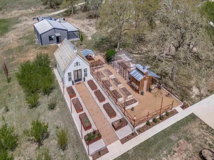 a view of a house with couches and sitting area