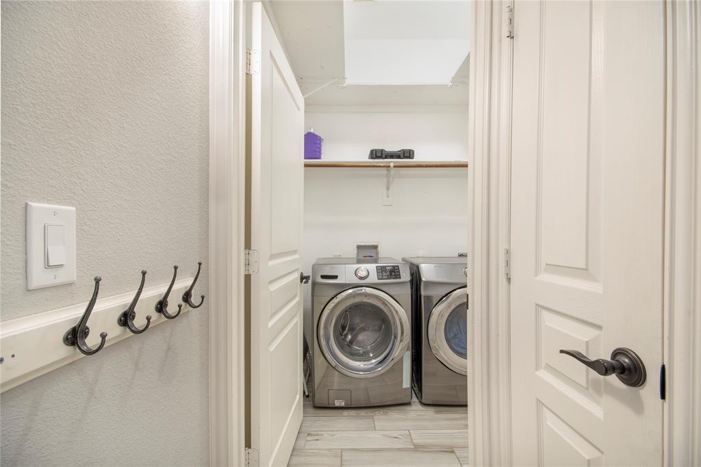 5116 Prospect Street McKinney, TX 75071 - Photo 3 of 23 a utility room with sink dryer and washer