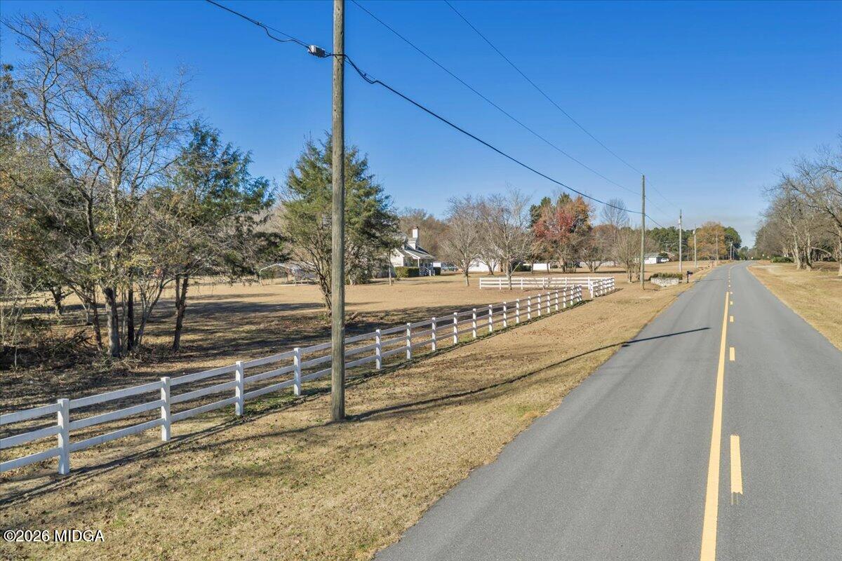 0 Rum Road Byron, GA 31008 - Photo 18 of 23 a view of a swimming pool with a porch