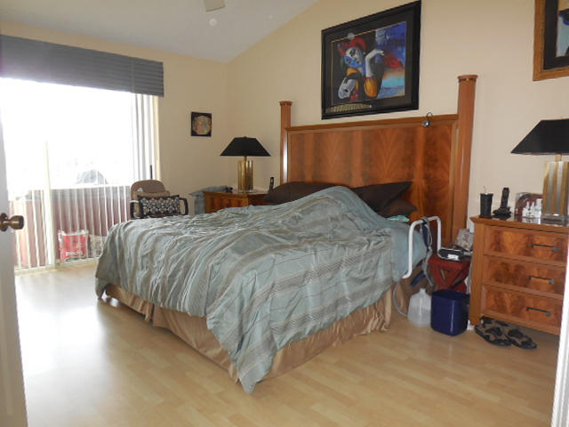 11286 Coral Key Drive Boca Raton, FL 33498 - Photo 22 of 43 MASTER BEDROOM WITH SLIDERS TO PATIO