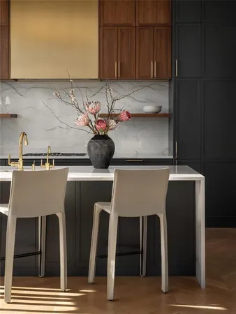 a kitchen with a refrigerator and a sink