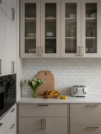 a kitchen with a sink and cabinets