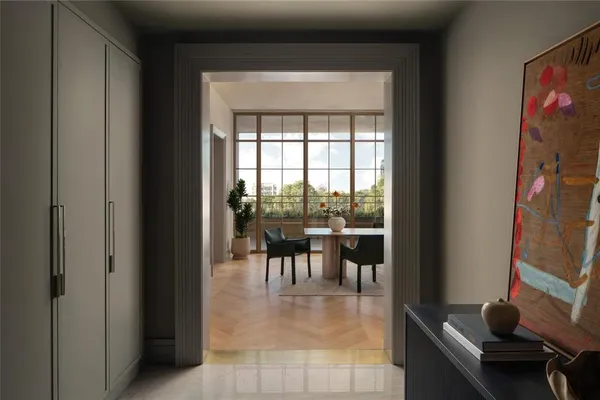 a dining room with furniture and a floor to ceiling window