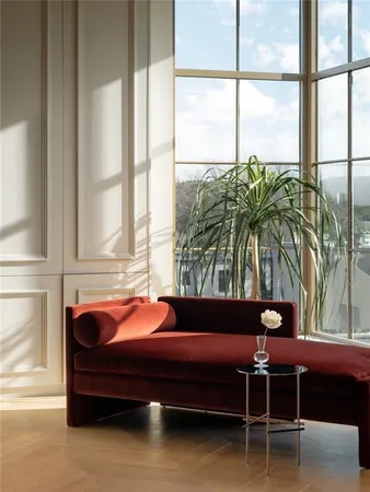 a sitting area with furniture and window